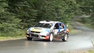 mitsubishi evo falls into a ditch, get's out [video]