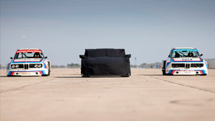 camouflaged bmw race car previewed ahead of official reveal