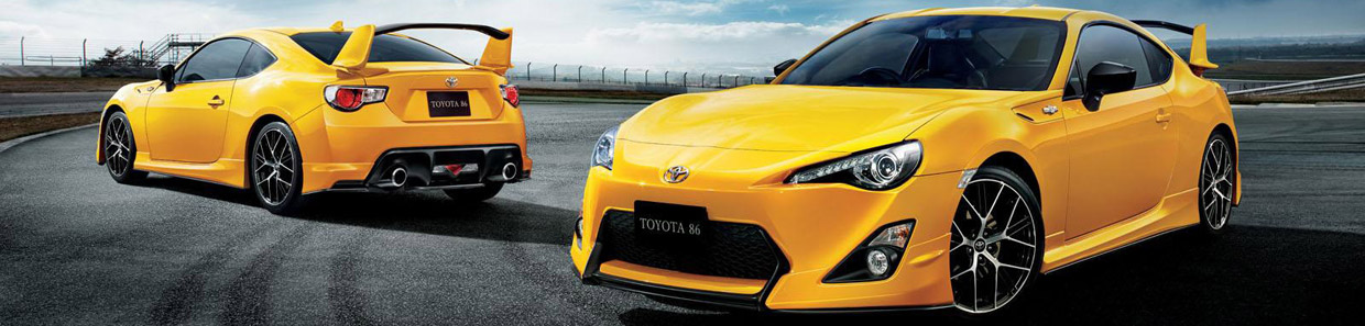 Two Toyota 86 Yellow Limited Cars