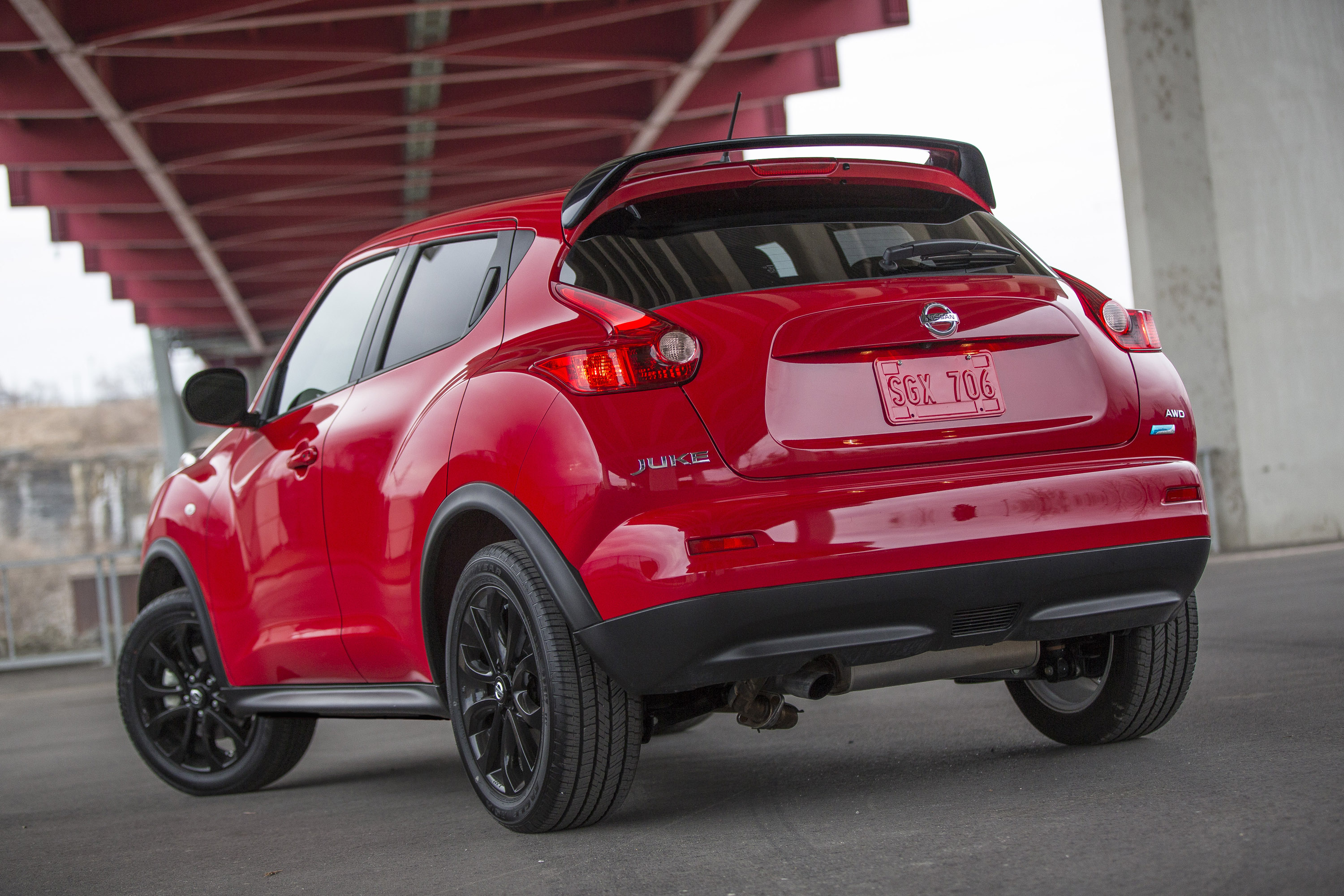 Спойлер жук. Nissan Juke 2014. Nissan Juke Nismo 2014. Ниссан Жук красный 2014. Nissan Juke 2012.