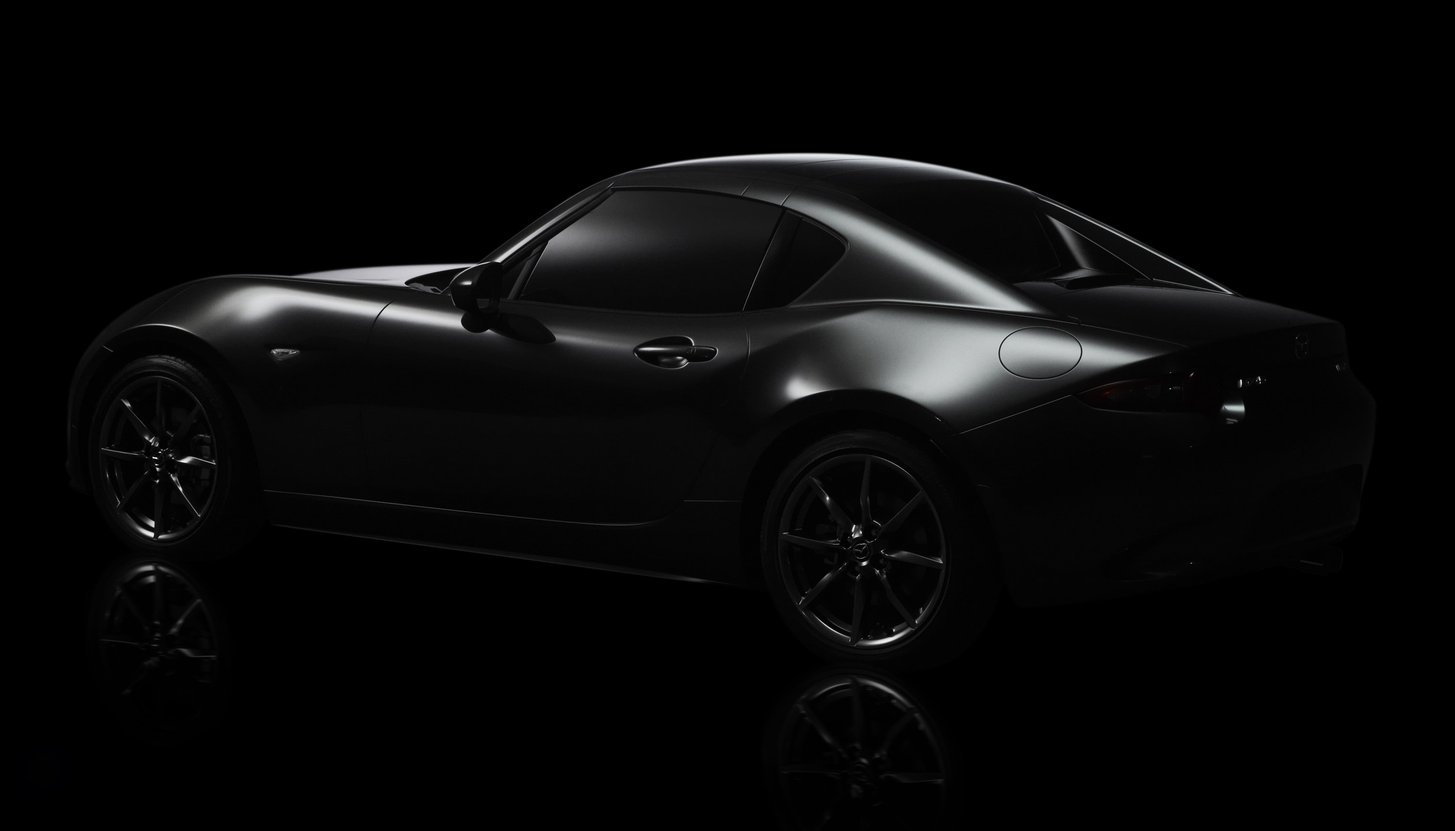 Mazda rf. Мазда мх5 RF. Обои Мазда. Mazda на черном фоне. Автомобиль на черном фоне.