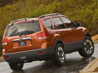 KIA Borrego (2009) - picture 8 of 14