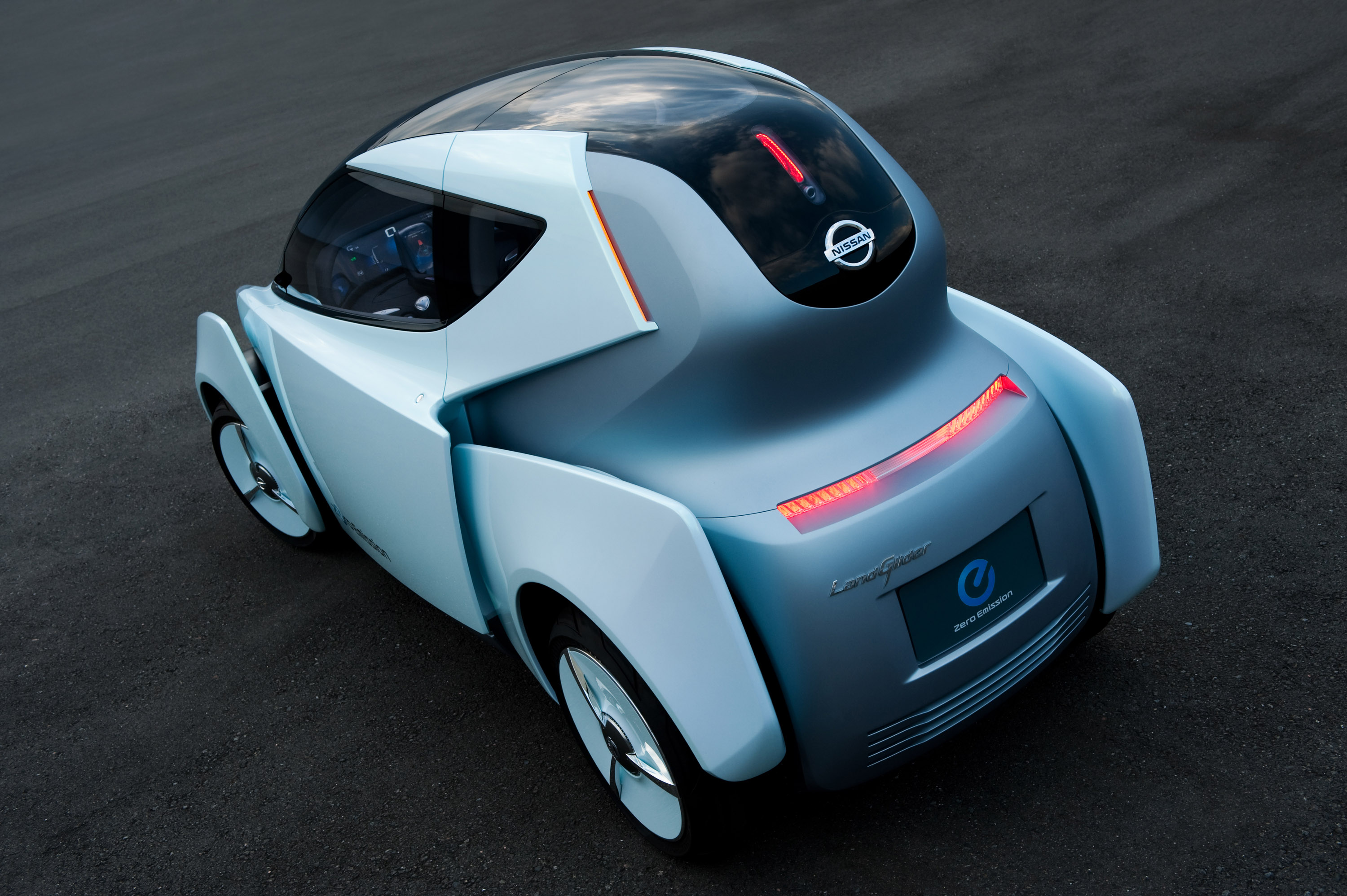 Новая электронная машина. Nissan Land Glider. Nissan Concept 2009. Nissan электромобиль концепт. Nissan электрокар концепт.