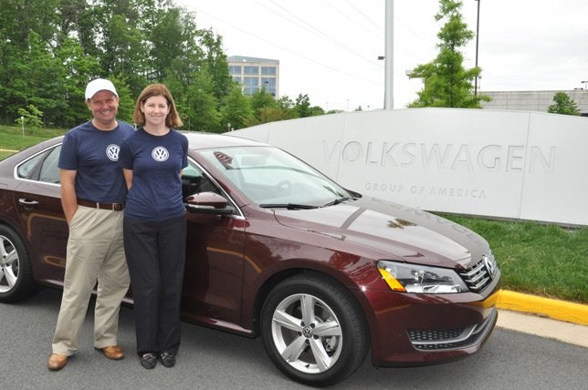 John and Helen Taylor next to the Volkswagen Passat TDI SE Clean Diesel