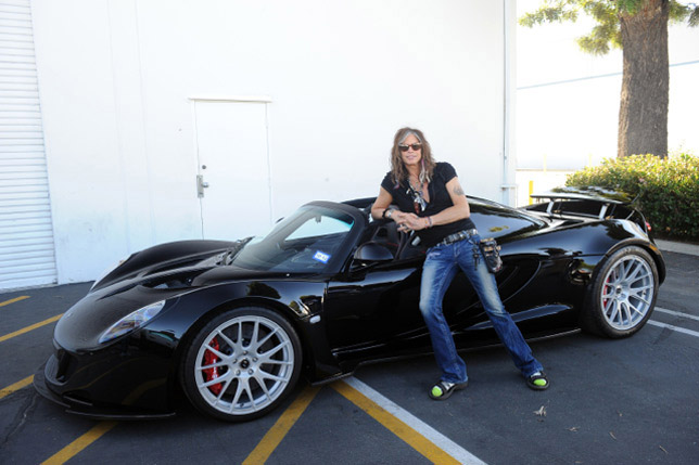 Steven Tyler next to his Hennessey Venom GT-Steven